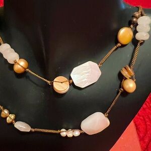 Beautiful flowing cream and marble look necklace.  Like new!